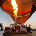 Tourist inside hot air balloon