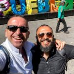 Friends posing in the Puebla sign