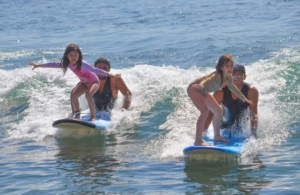 friends surfing